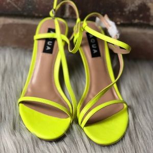 Woman’s aqua high heels